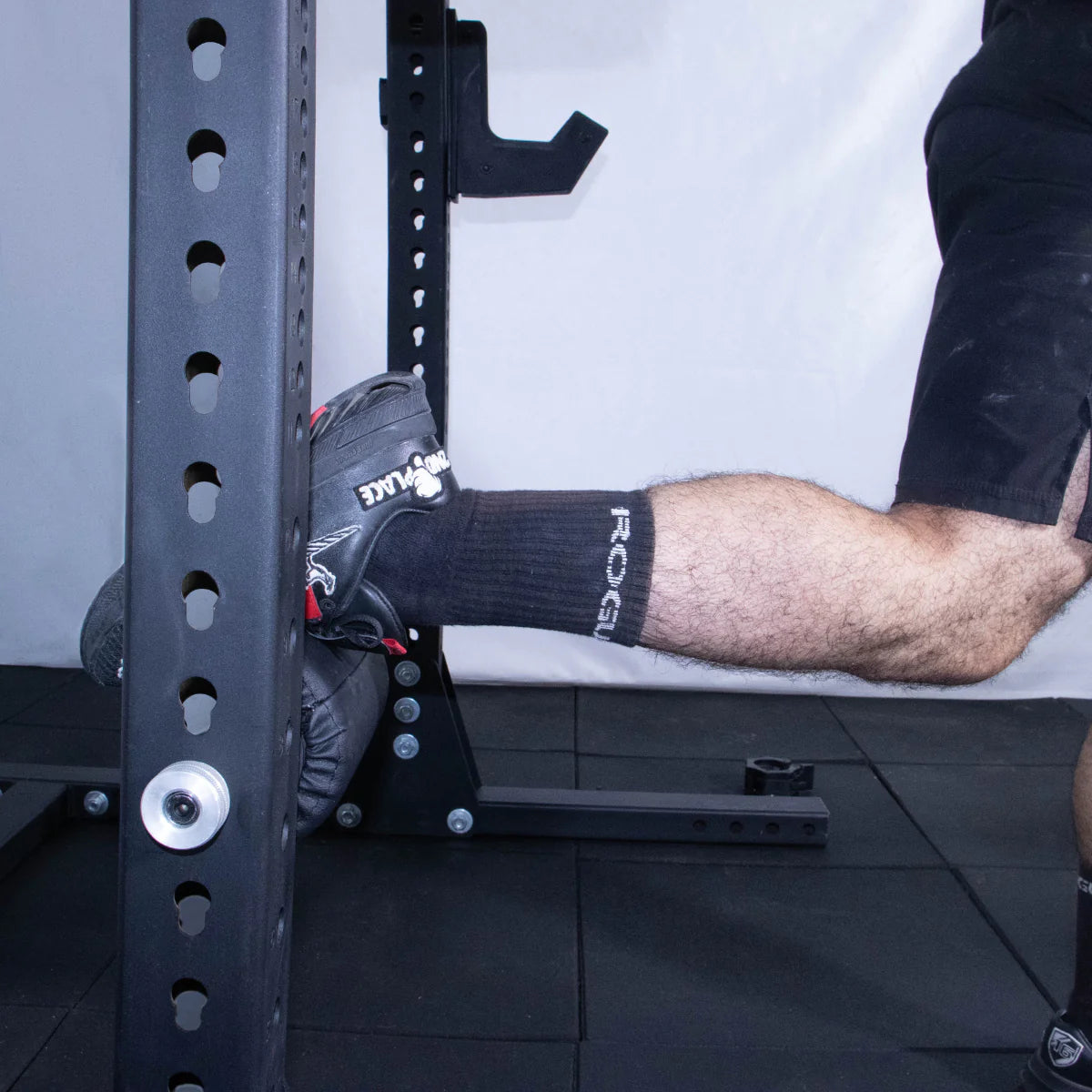 Leg Roller Navyfit multifuncional para racks, ideal en sentadillas búlgaras y ejercicios de piernas